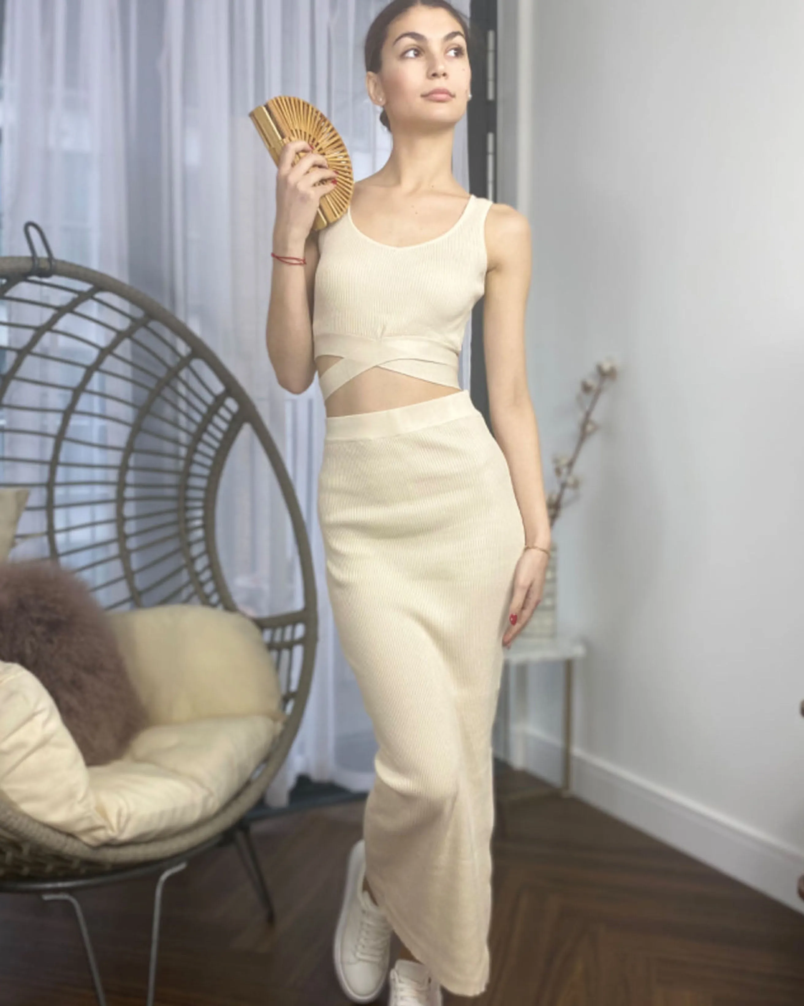 Knitted bodycon style vest top with tie up design and midi pencil skirt co-ords set in beige