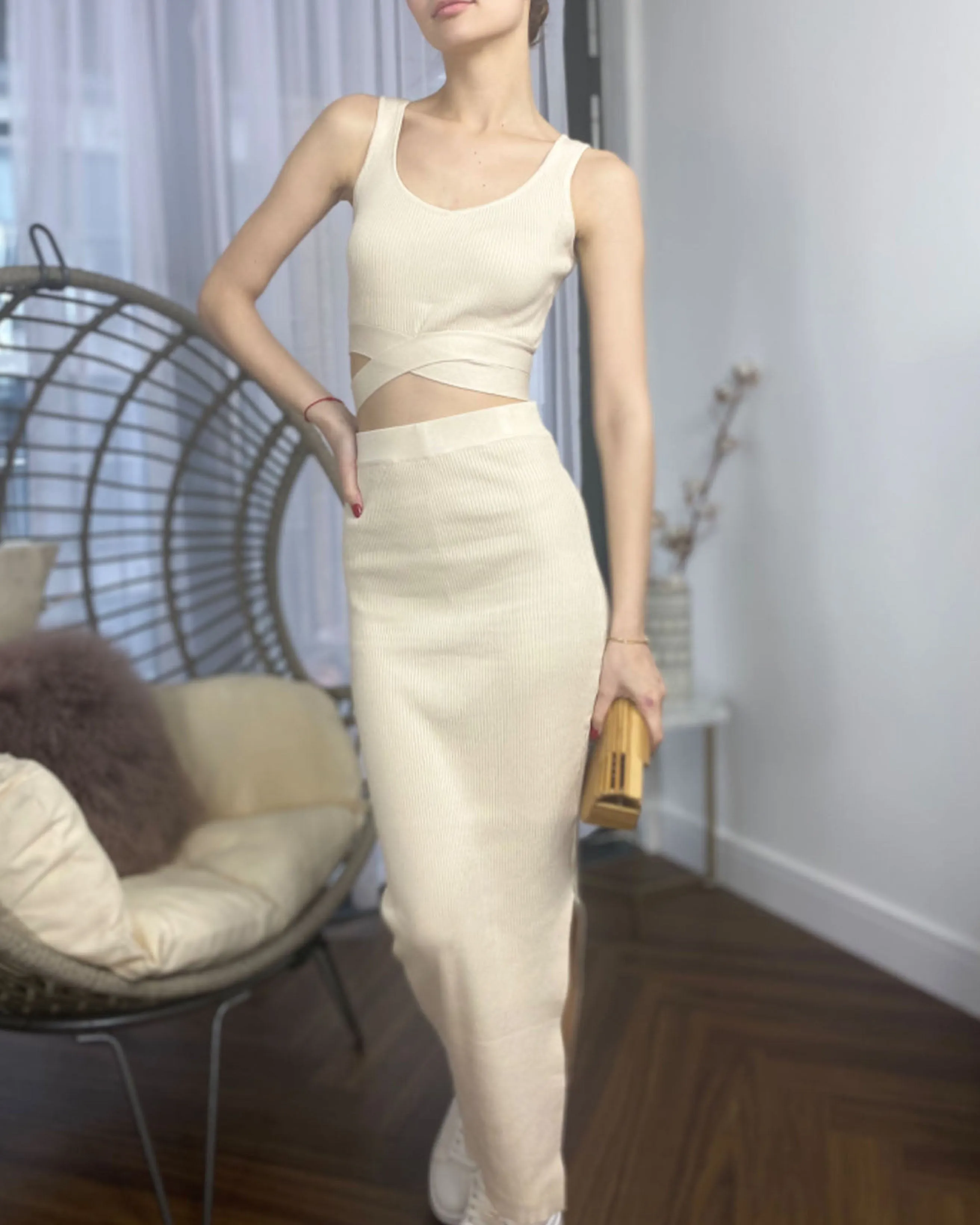 Knitted bodycon style vest top with tie up design and midi pencil skirt co-ords set in beige